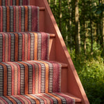 Striped flatweave runner in orange black red
