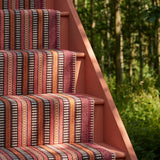 Striped flatweave runner in orange black red