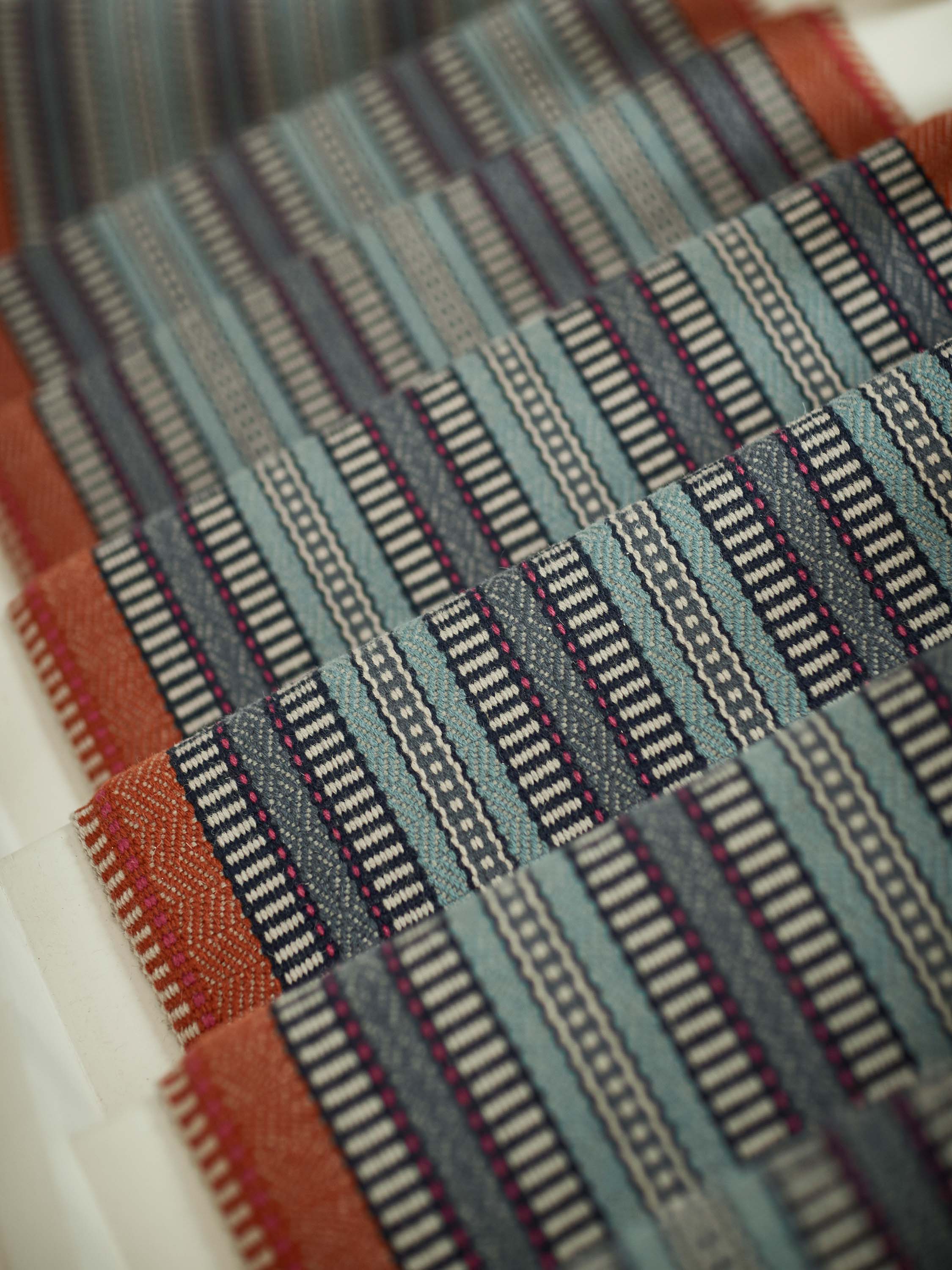 Striped flatweave runner in orange black blue 