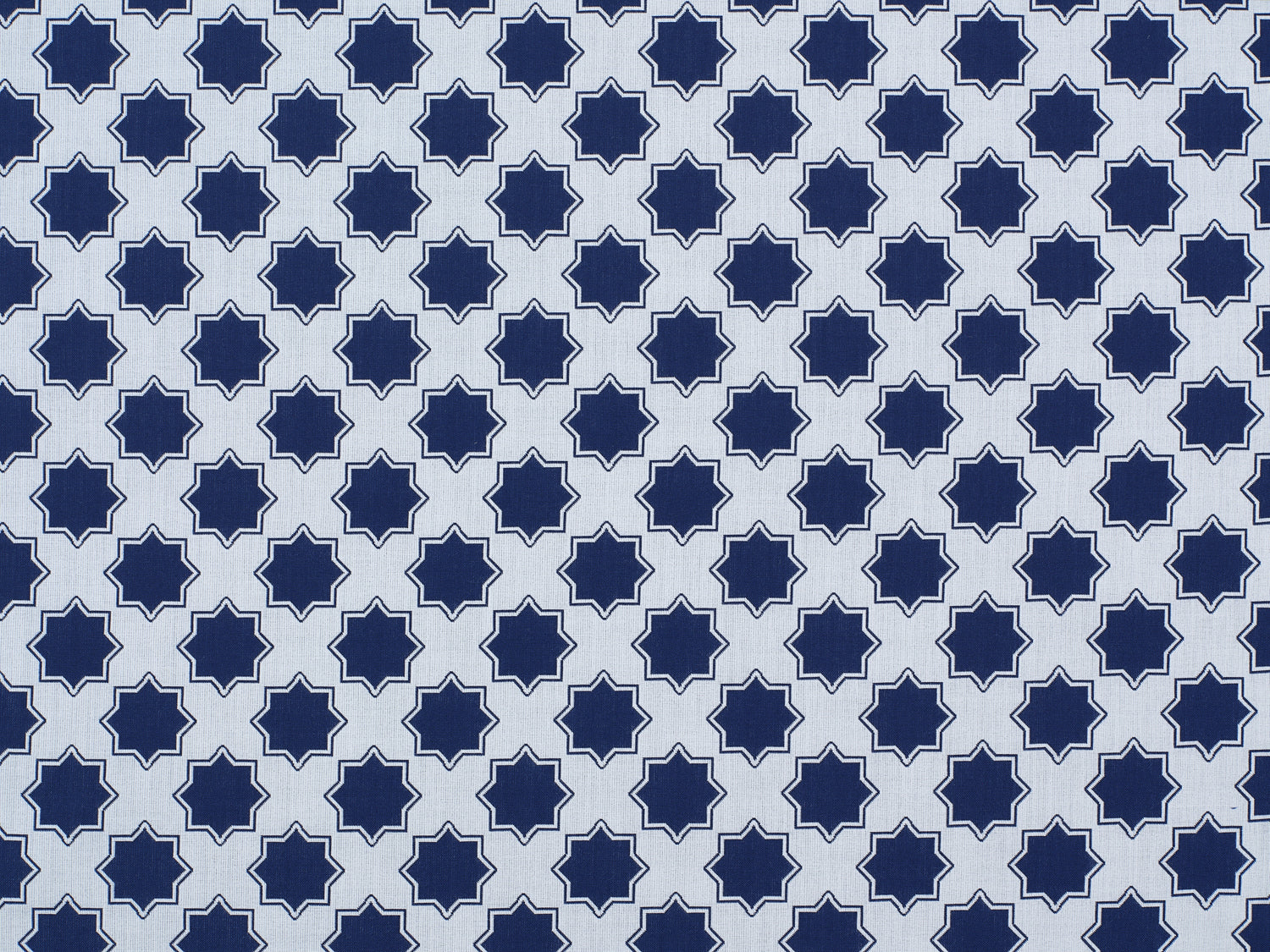 Moroccan star performance fabric in blue on white. 