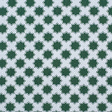 Moroccan star performance fabric in green on white. 