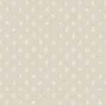 Detail of wallpaper in a repeating leaf print in white on a cream field.