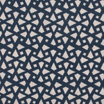 Detail of fabric in a geometric lattice print in navy on a cream field.