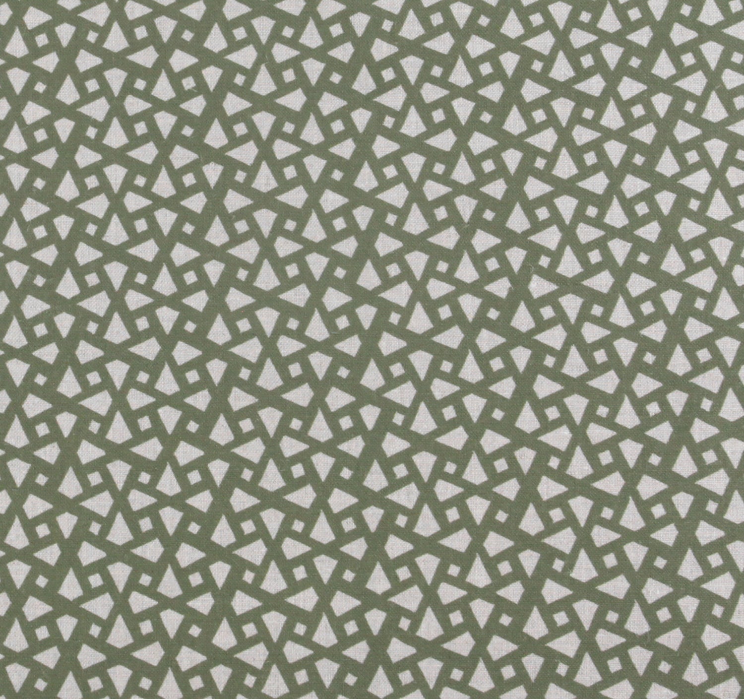 Detail of fabric in a geometric lattice print in sage on a greige field.
