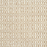 A rug with a woven overall pattern in tan and ivory.