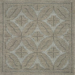 Handmade rug with classic circle lattice design in grey.