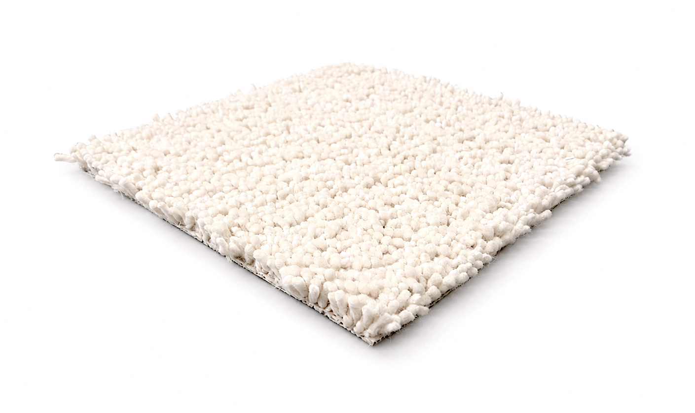 A square sample of a high-pile shag carpet in an off-white or cream color, shown at an angle on a clean white background.