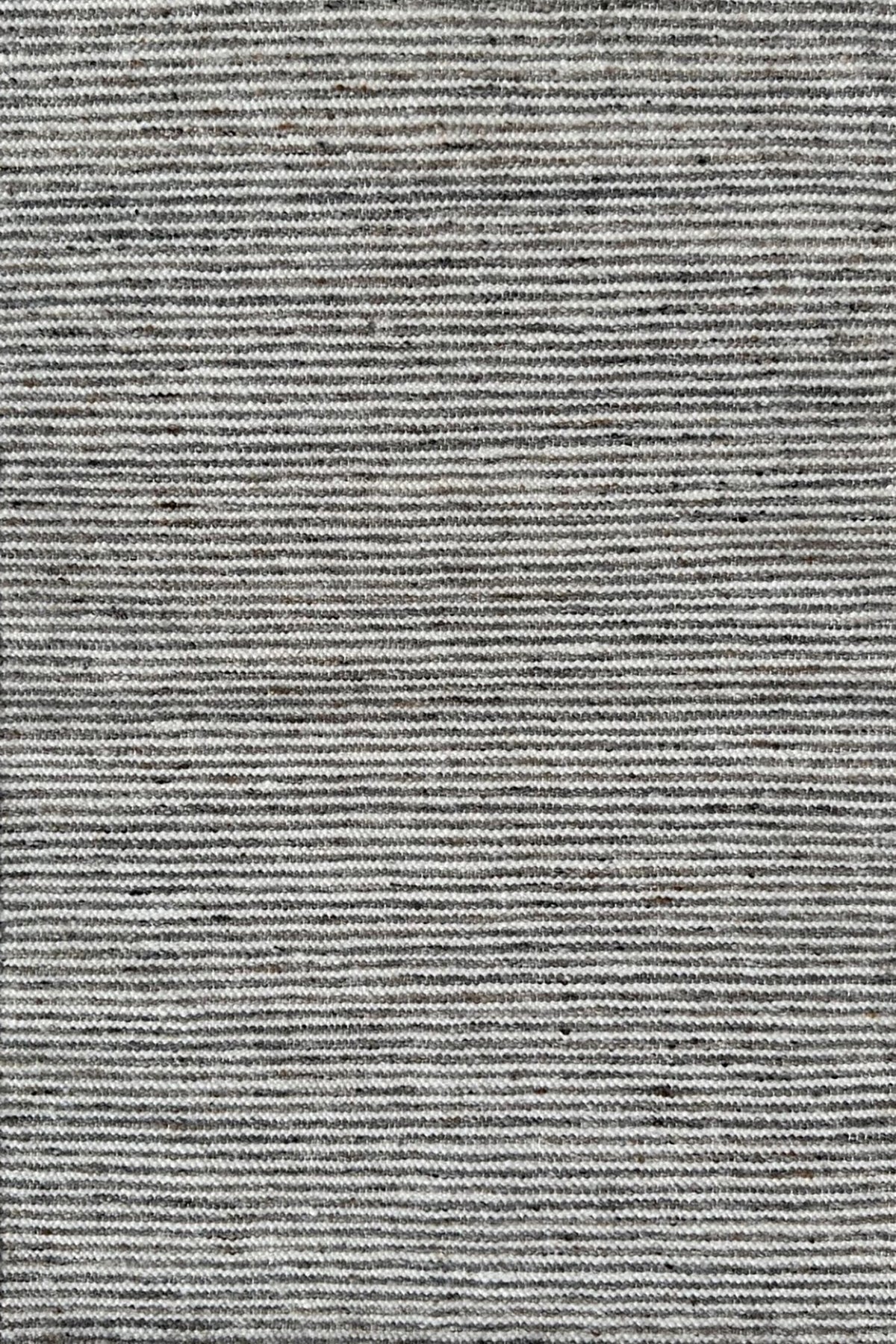 Flatweave rug in a a sutble stripe of white and grey.
