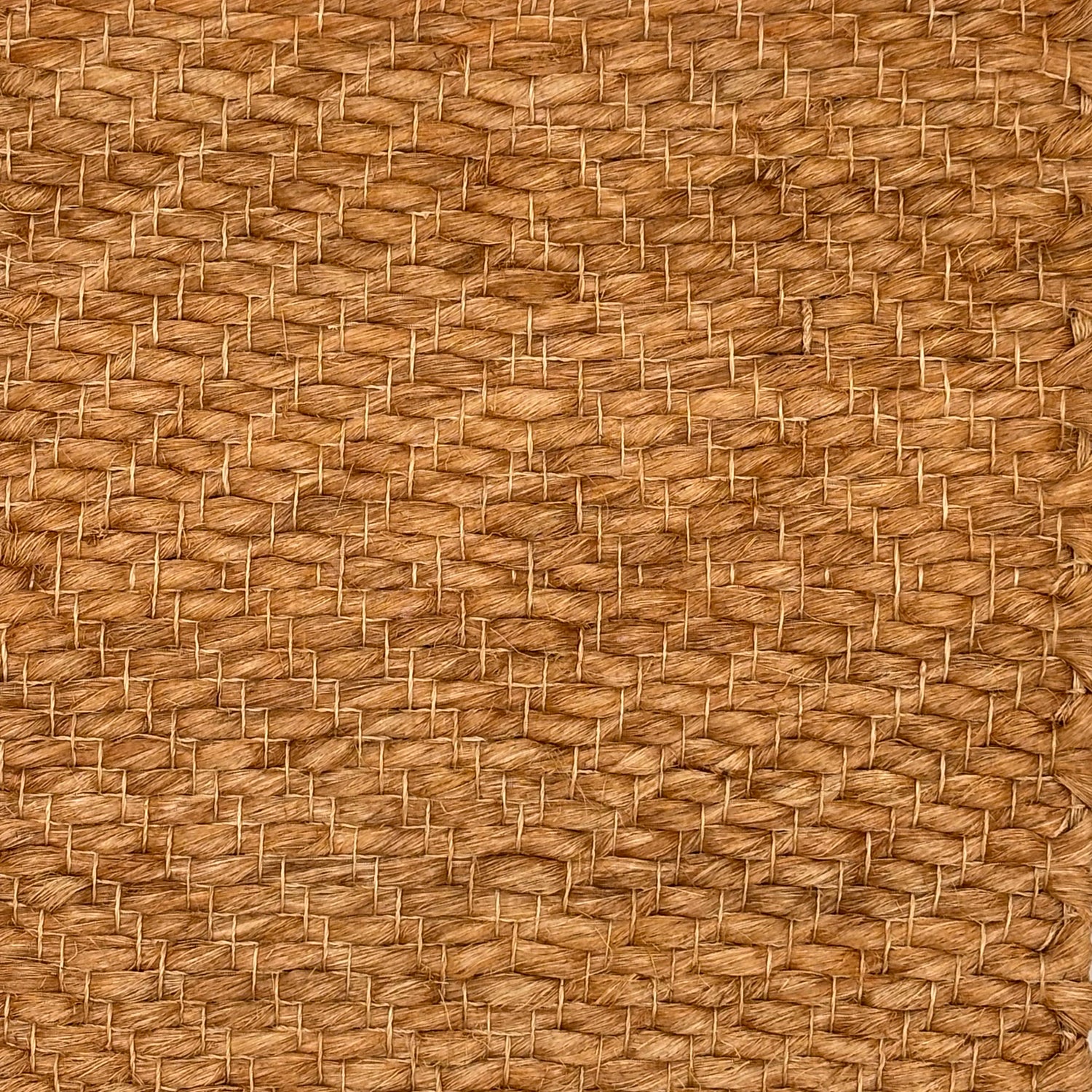Handwoven rug sample in brown abaca.