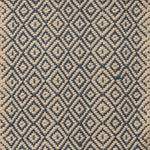 Flatwoven rug in a diamond pattern in blue and cream.