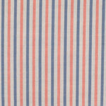 Detail of fabric in a small-scale stripe print in pink and blue on a greige field.
