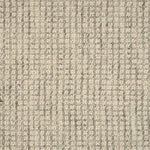 Broadloom carpet in a textural checkered pattern in ivory and grey.