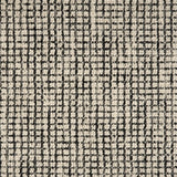 Broadloom carpet in a textural checkered pattern in ivory and strie black. 