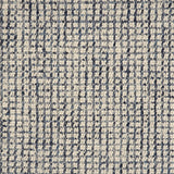 Broadloom carpet in a textural checkered pattern in ivory and blue.