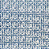 Detail of fabric in a floral grid print in white on a navy field.