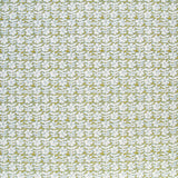 Detail of fabric in a floral grid print in white and blue on a mustard field.