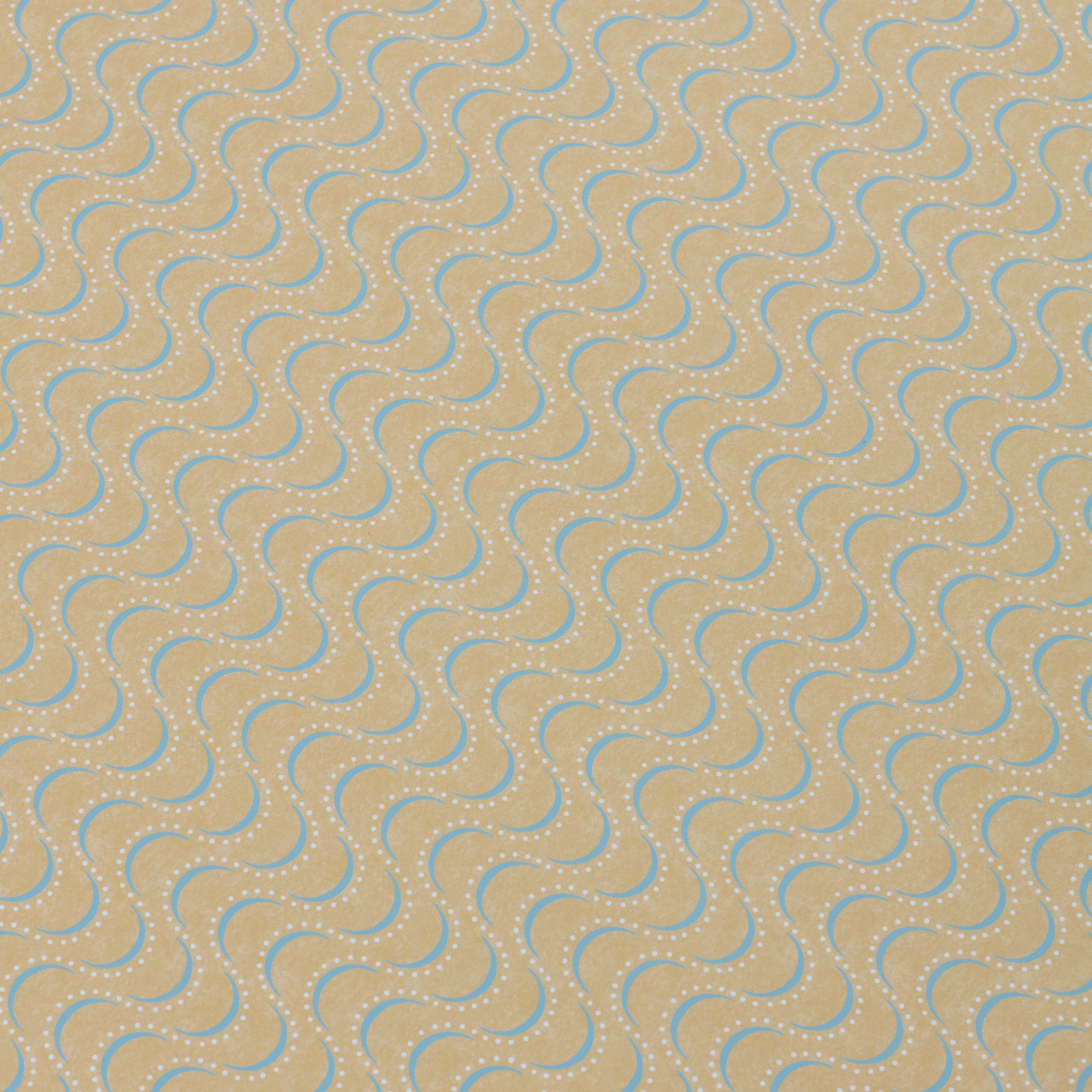 Detail of a wallpaper panel in an undulating stripe pattern in blue and white on a mustard field.