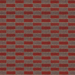 Handwoven carpet in a geometric design in brown, red with yellow accent. 