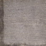 Handknotted rug with border and subtle rib design in grey