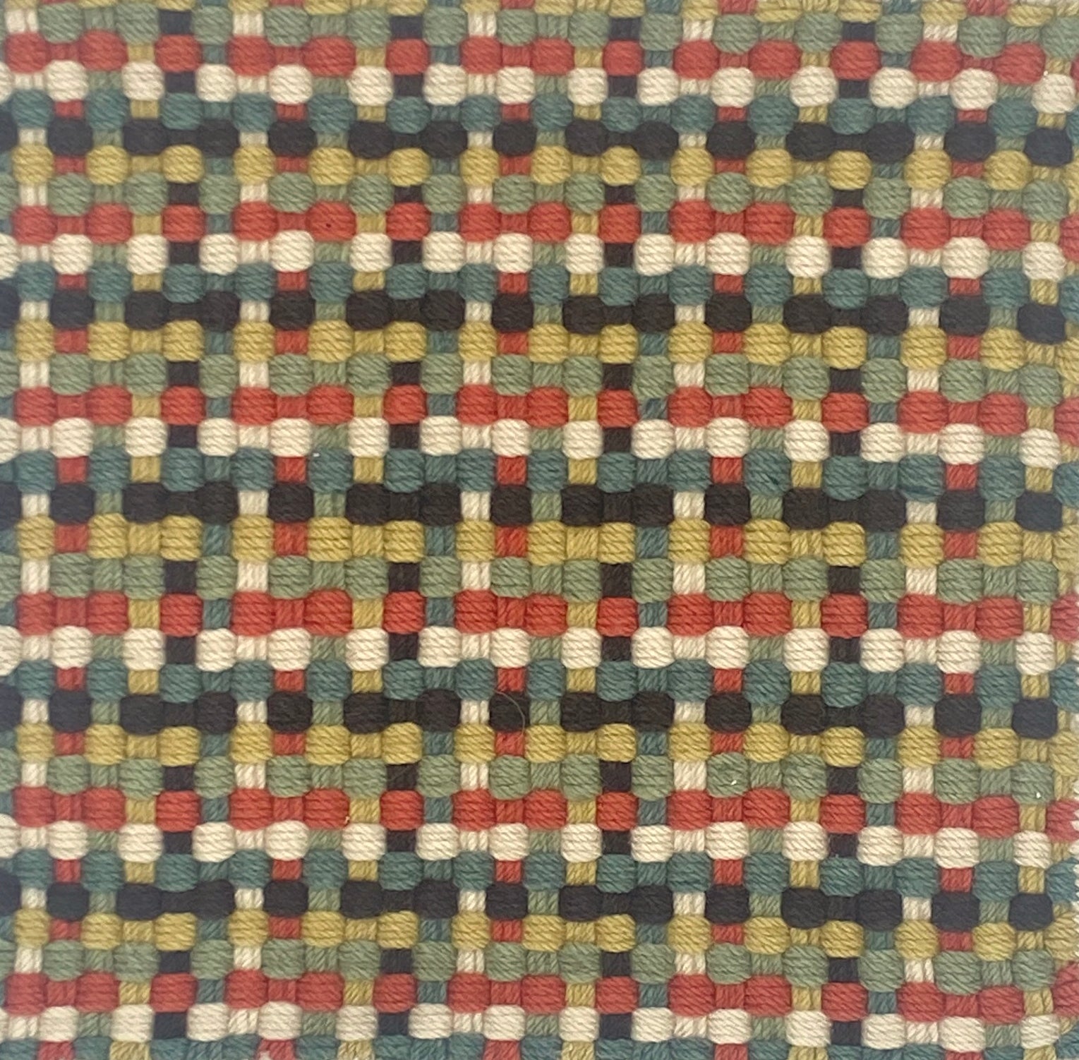 Multicolored woven pattern carpet swatch