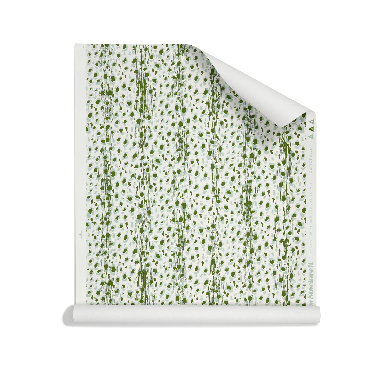 Roll of wallpaper with small scale painterly animal print in light blue and green on white. 