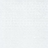 Detail of wallpaper in an abstract grid print in white.