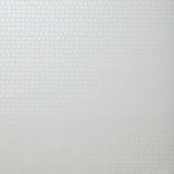 Detail of wallpaper in an abstract grid print in light gray.