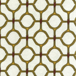 Detail of fabric in a rounded lattice print in yellow and red on a mottled cream field.