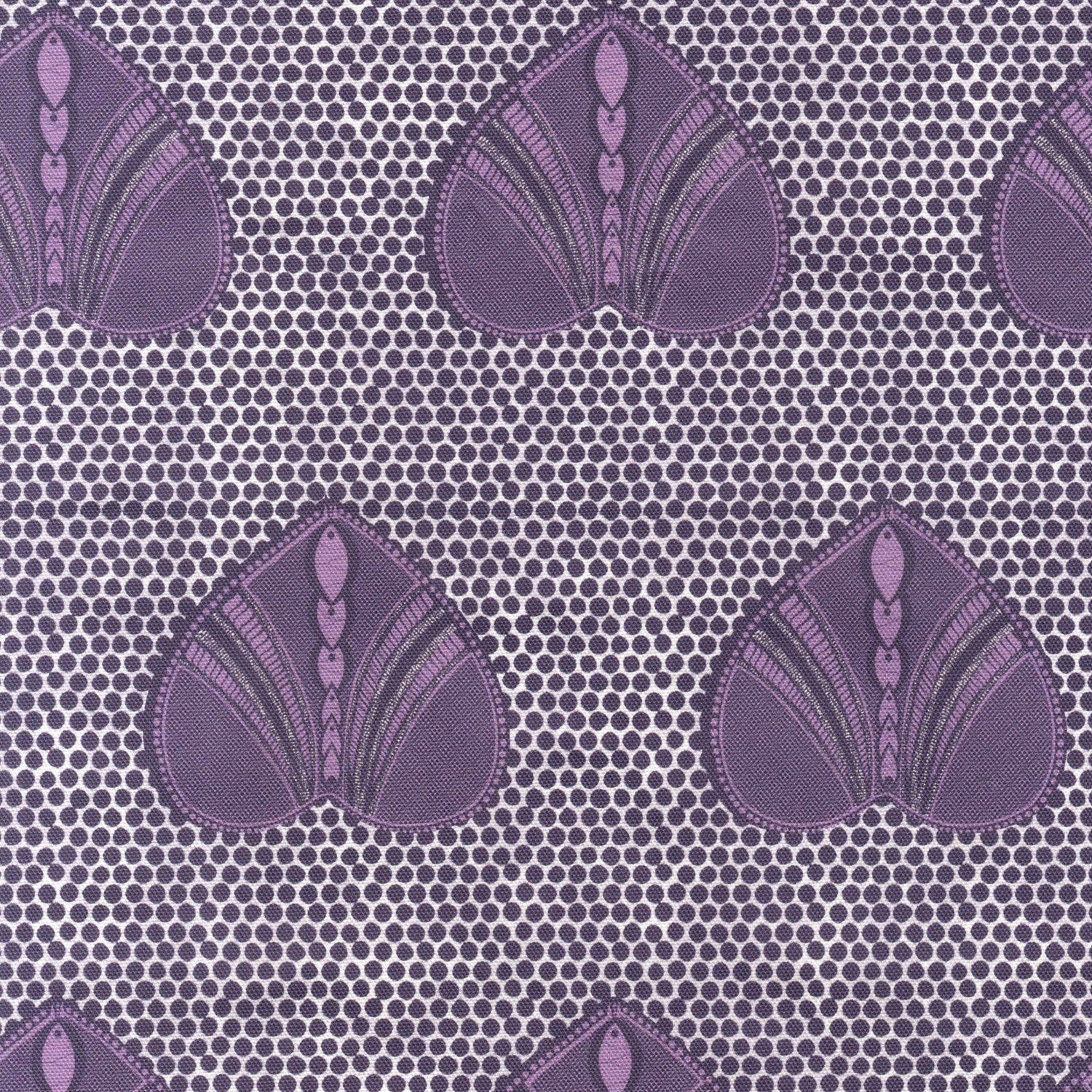 Detail of fabric in a geometric heart print in purple and black on a light purple field.