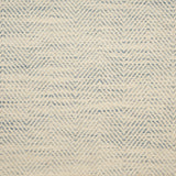 Broadloom carpet with herringbone weave in cream blended with light blue. 