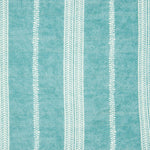 Detail of fabric in a small-scale botanical stripe print in white on a teal field.
