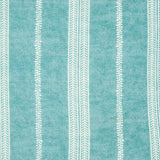 Detail of fabric in a small-scale botanical stripe print in white on a teal field.
