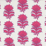 Detail of fabric in a repeating thistle print in pink and purple on a white field.