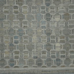 Textured fabric with a geometric pattern in shades of gray.