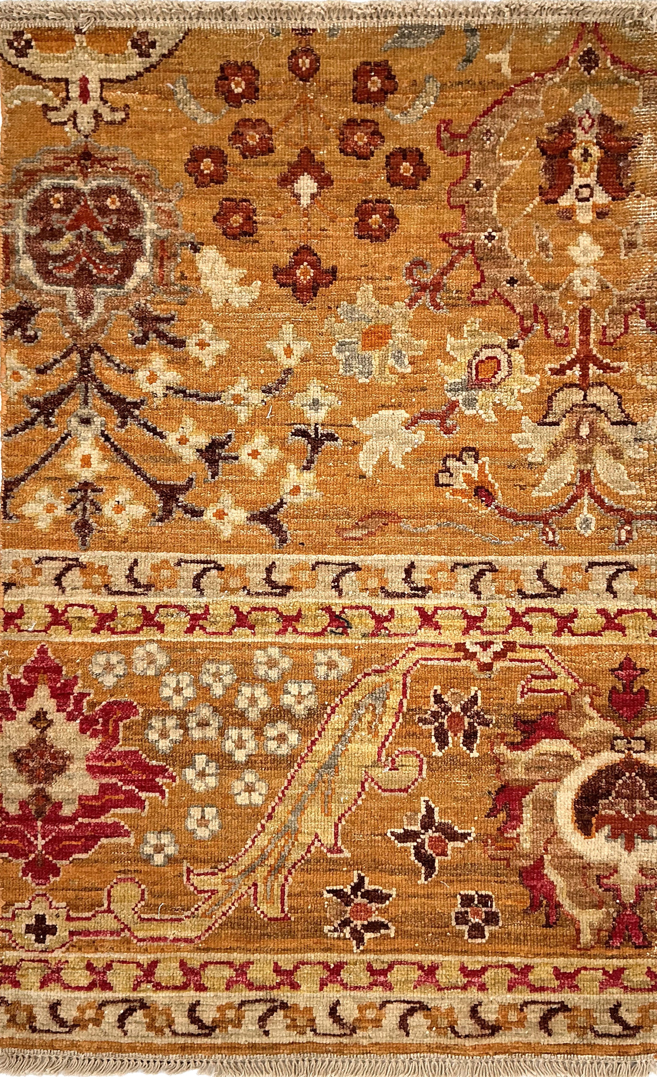 Decorative rug with intricate patterns and colors on a brown background