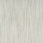 Broadloom carpet in a textural striated pale grey. 
