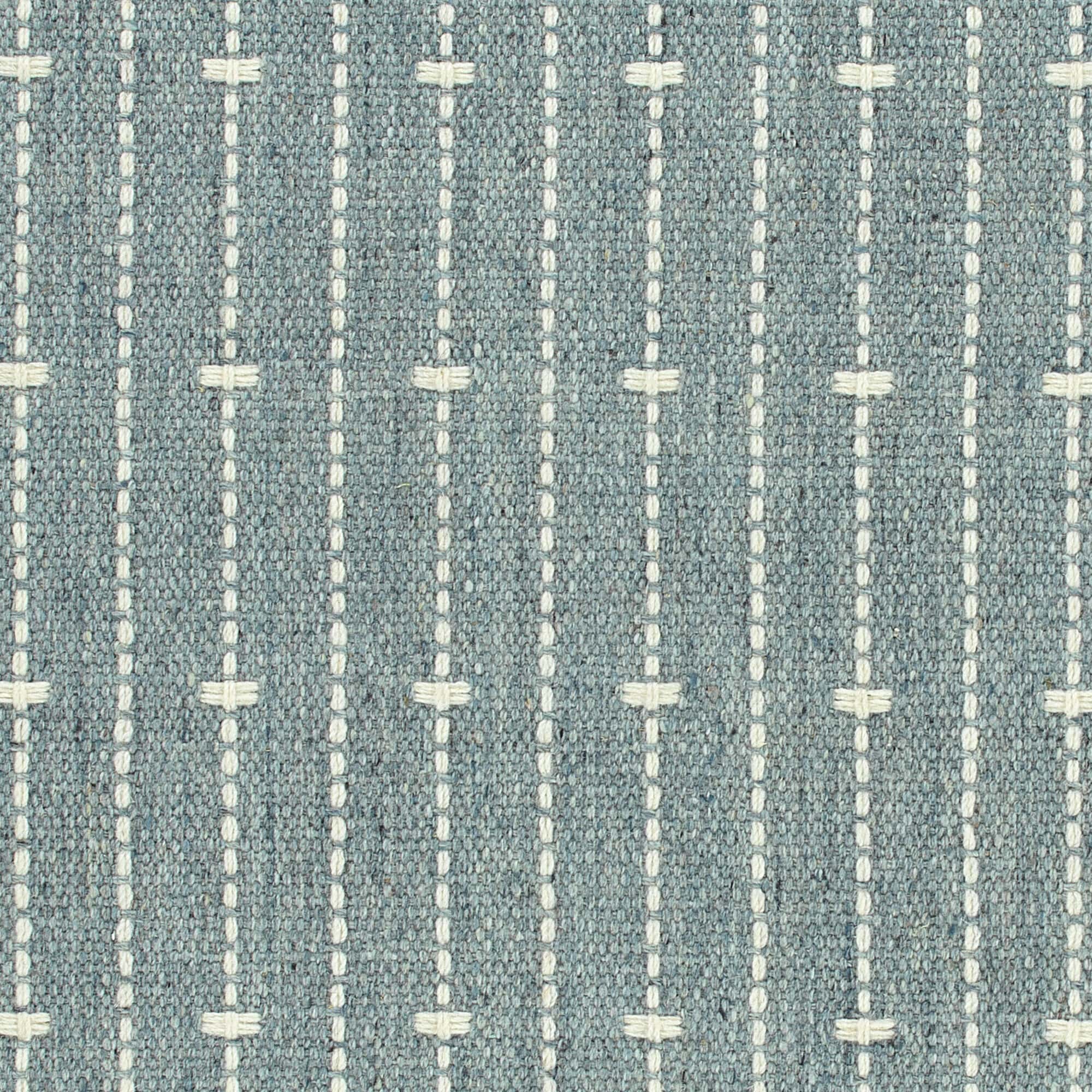 Broadloom carpet in ticking stripe in cream on chambray blue. 