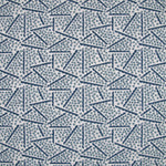 Printed fabric detail in a playful dot and line pattern in sky blue and indigo