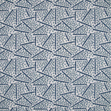 Printed fabric detail in a playful dot and line pattern in sky blue and indigo