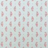 Detail of wallpaper in a floral paisley print in red on a light blue field.