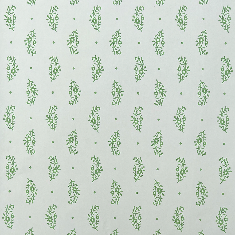 Detail of wallpaper in a floral paisley print in green on a blue-gray field.