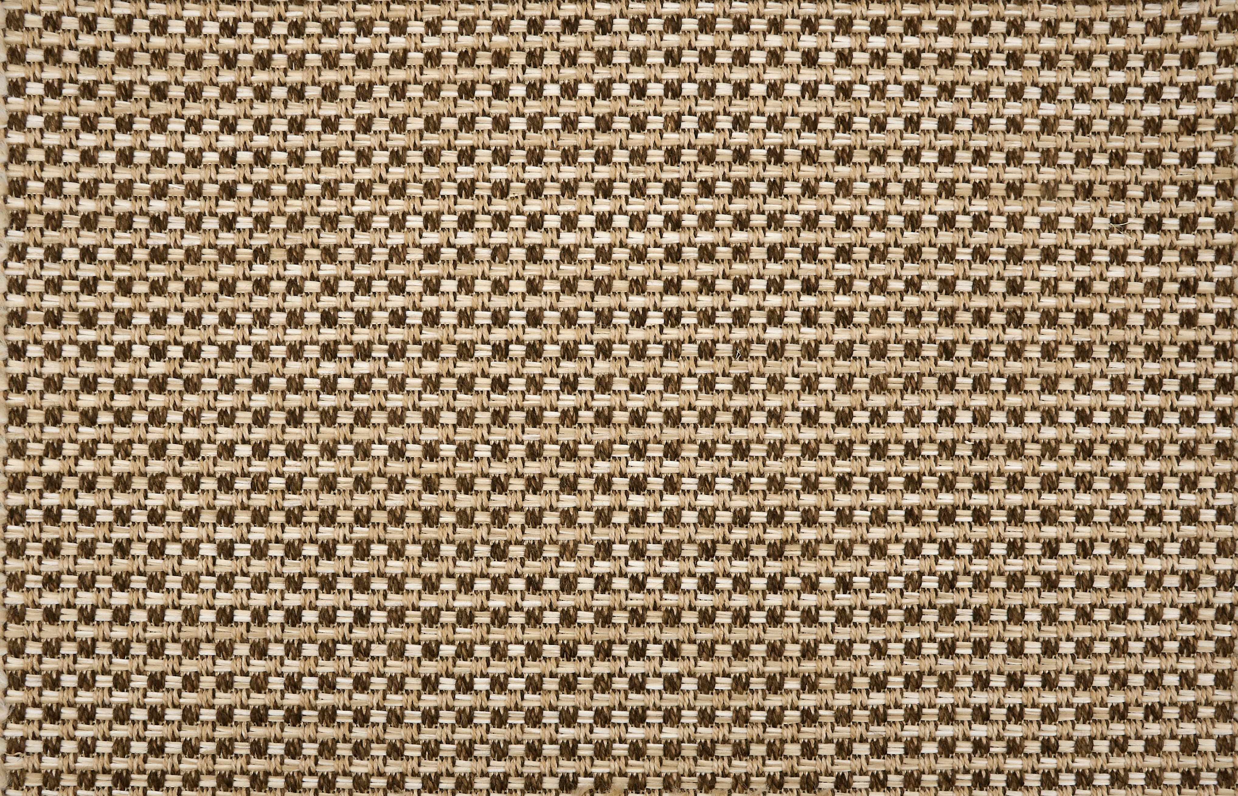 Broadloom carpet in textural weave in brown.