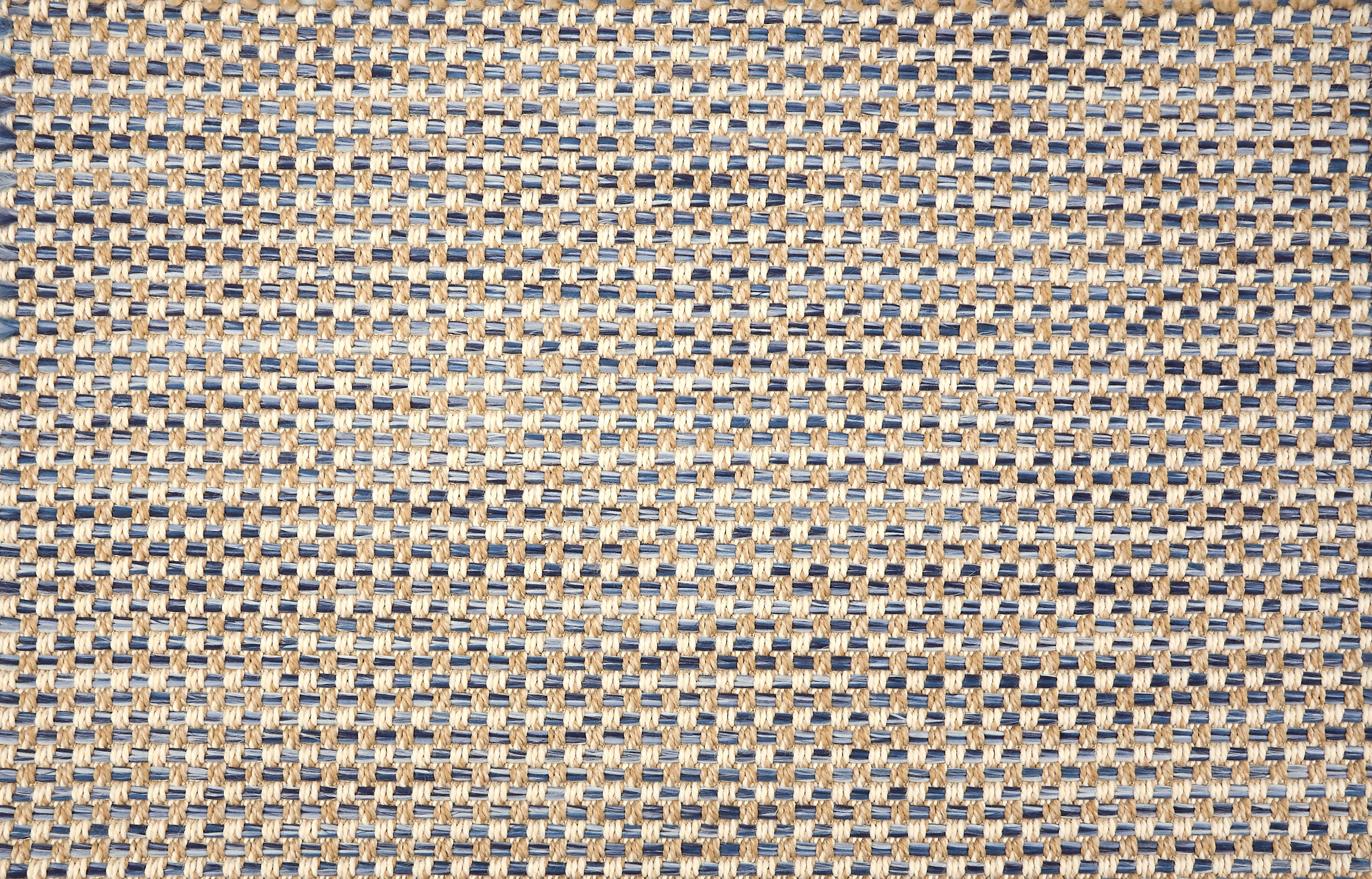 Broadloom carpet in textural weave in blue and beige. 