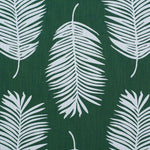 Palm print performance fabric in white on green. 