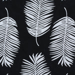 Palm print performance fabric in white on black. 