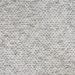 Broadloom carpet swatch in a textured pattern in a light grey design
