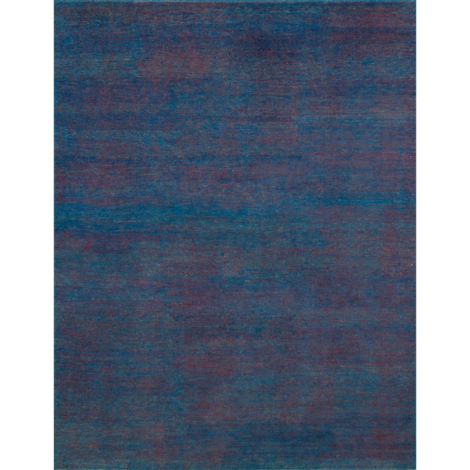 A full size rug with teal and red woven together.