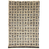 Patterned rug with geometric design on a white background
