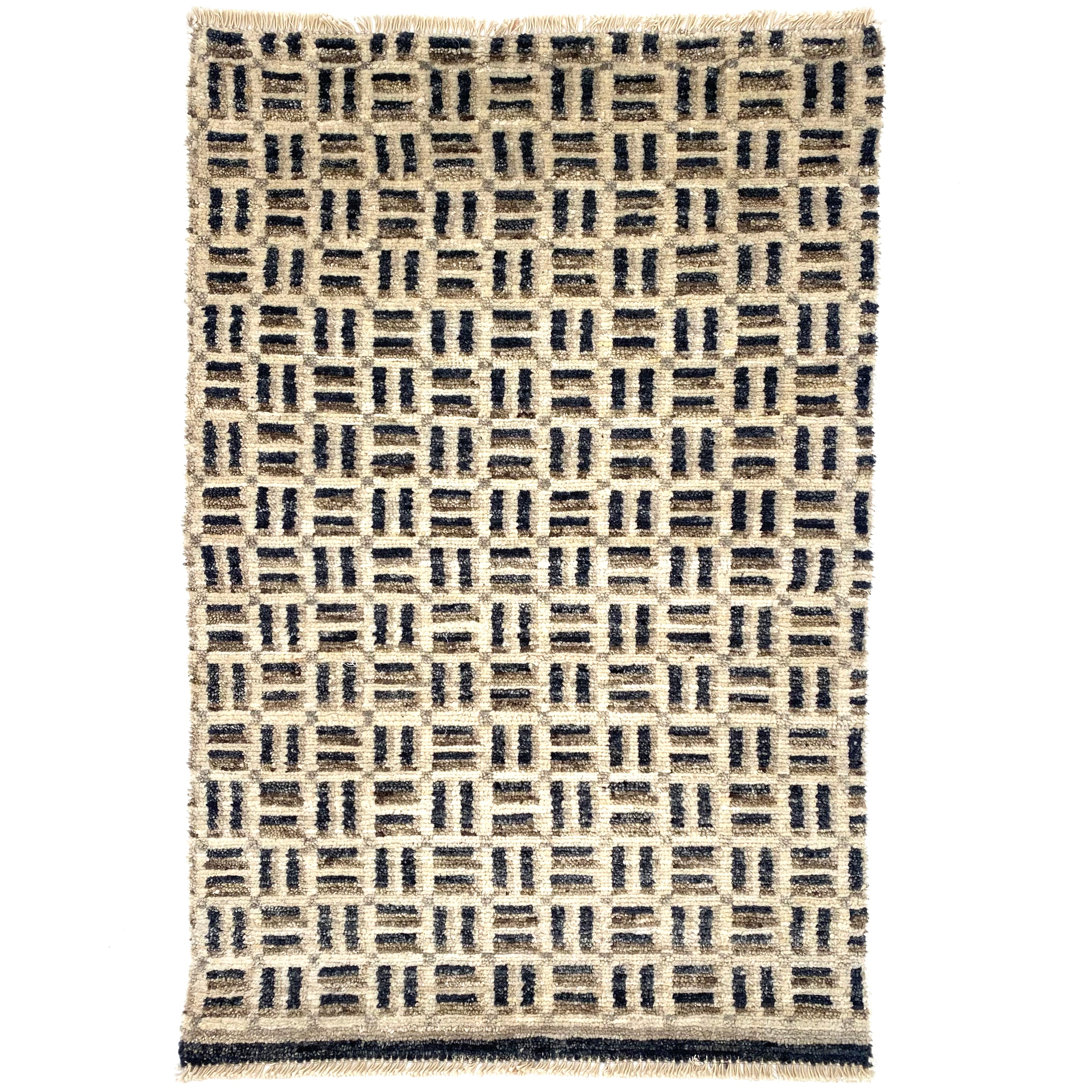 Patterned rug with geometric design on a white background