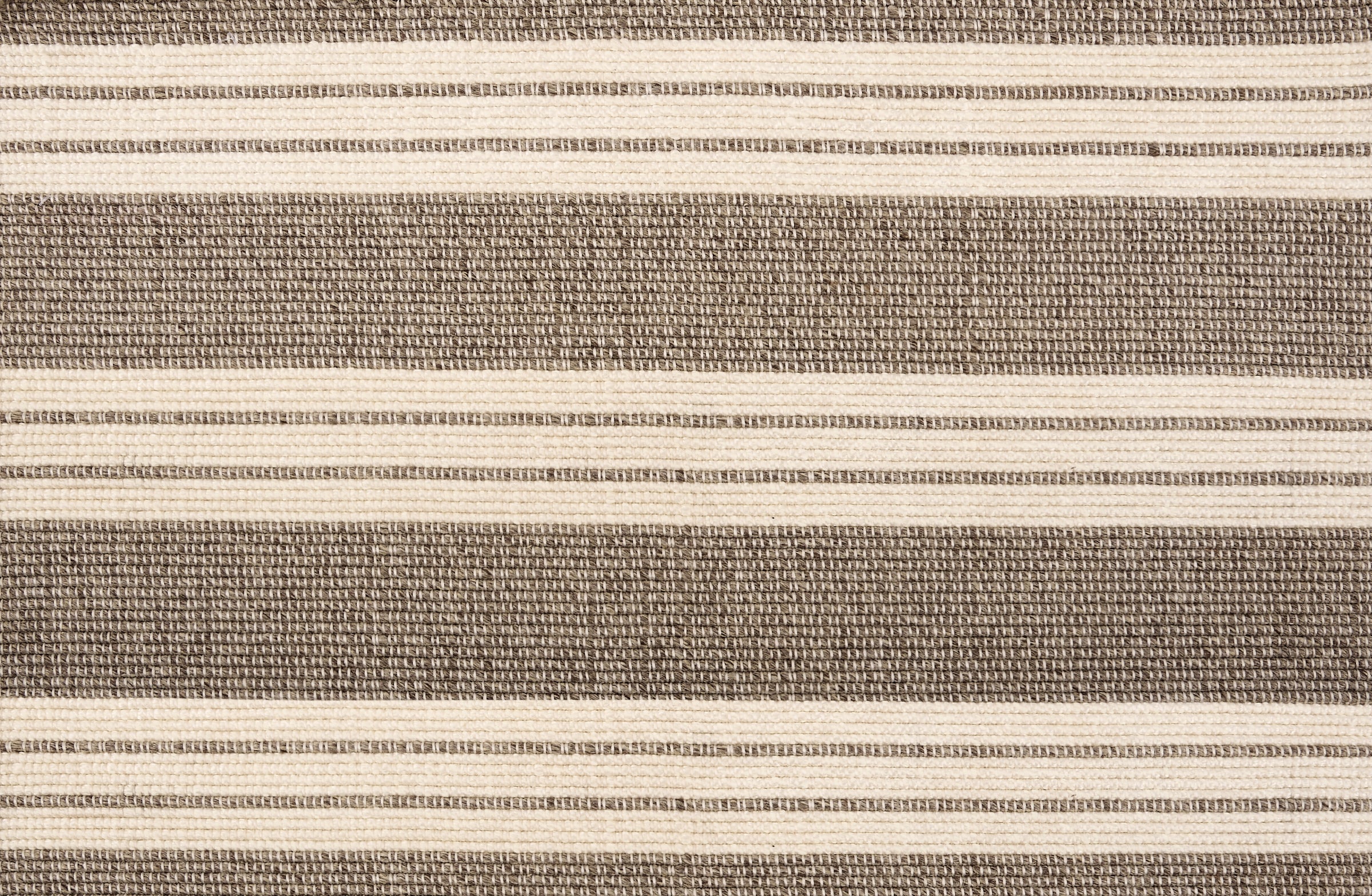 Broadloom carpet in a wide stripe in grey and cream with grey accent stripes. 